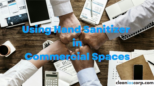 Hand Sanitizer for Commercial Use- i feature image of a team of business people fist bumping in unison
