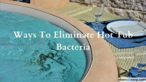 Hot Tub Bacteria- Feature Image of a outside hottube in a spa setting